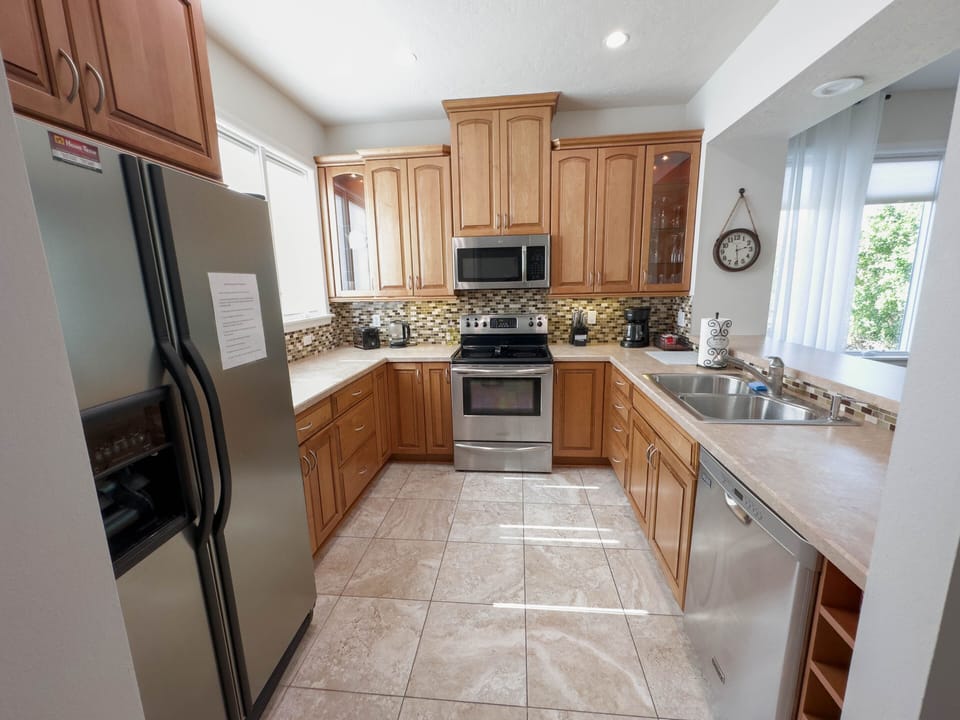 kitchen included with appliances and coffee machine  