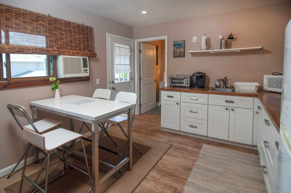 Kitchen area and window AC.