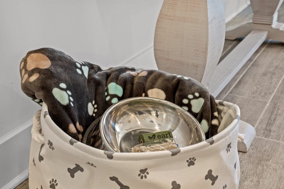 Bringing your fur baby? We'll have a pet basket with blanket, dishes, treats and waste disposal bags waiting for your pup(s)!