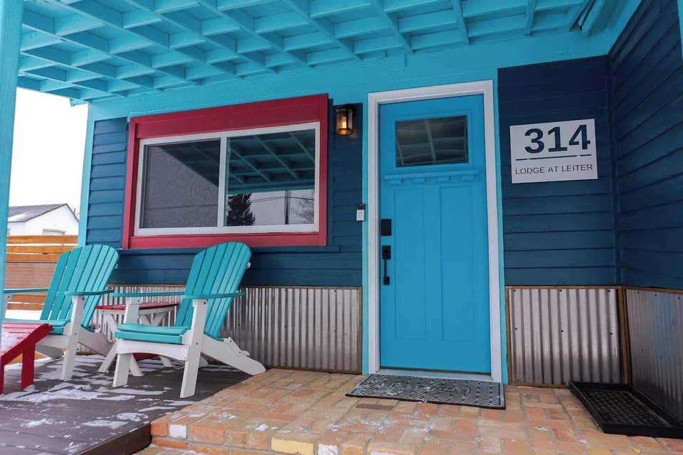 Welcome to Leadville!  We painted the Lodge "Deep Breath Blue".  Seemed appropriate for an elevation of 10,100 feet!  Westward facing, the front porch is the perfect spot for a drink at sunset!