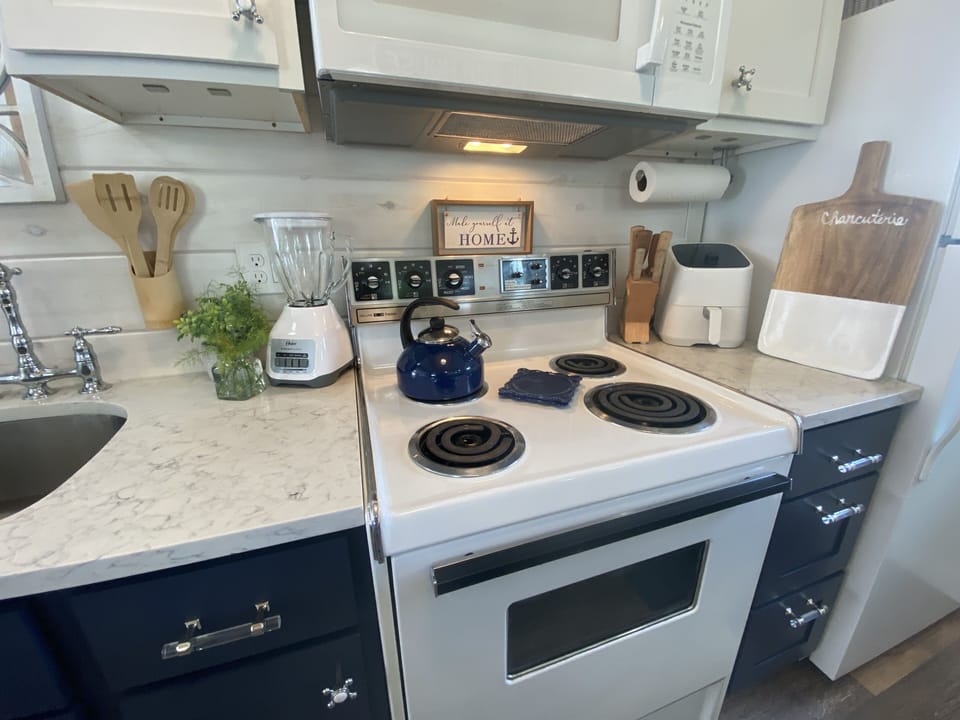 Microwave, Blender, Air Fryer, Tea Kettle and Charcuterie Board. 