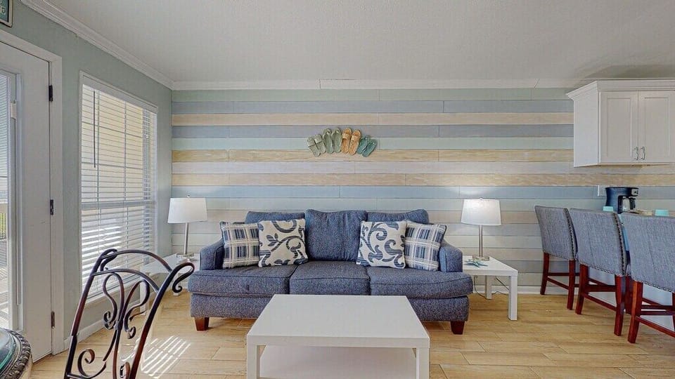 And that balcony is accessed through the living room