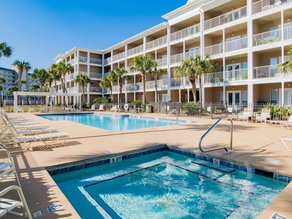 Seasonally heated pool with huge hot tub 