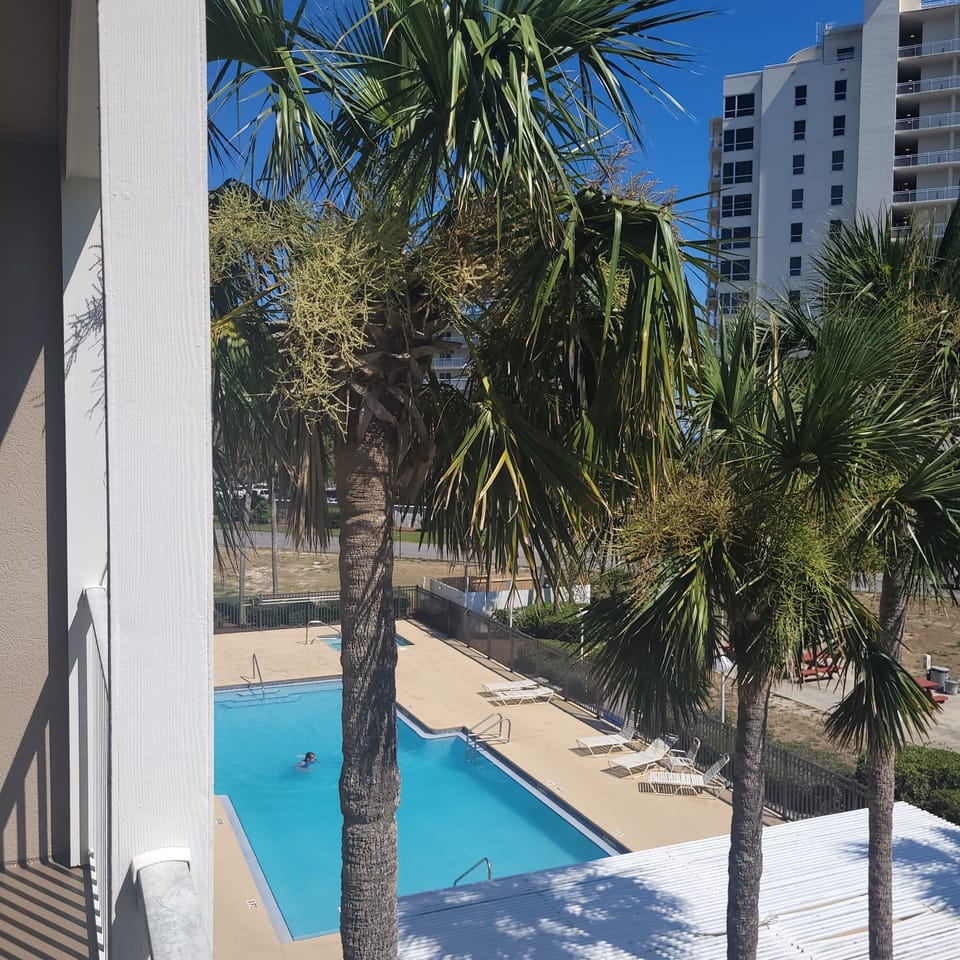 view of pool from balcony
