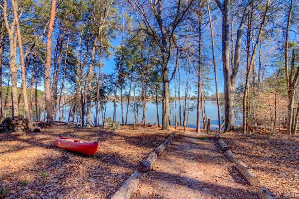 View of the lake from ground level at the back of the home. 