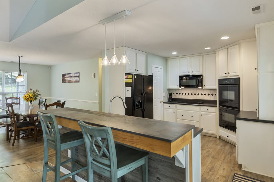Kitchen from sliding door by living room.