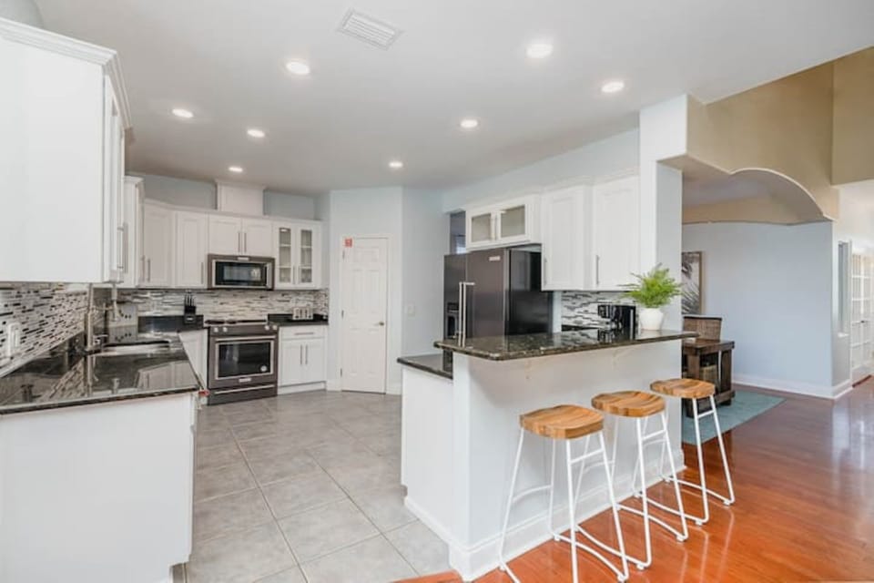 Fully stocked kitchen with an additional, larger refrigerator in the garage! 