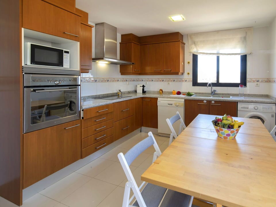 Cabinetry, Countertop, Furniture, Kitchen Sink, Sink, Kitchen Stove, Wood, Kitchen, Kitchen Appliance, Chair