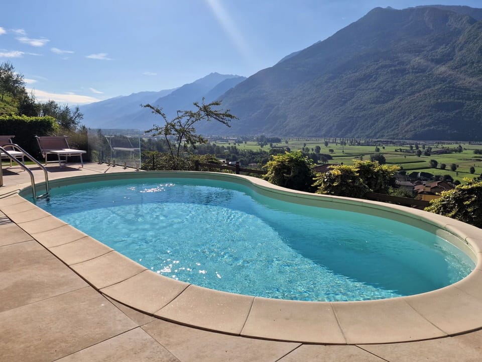 Water, Sky, Daytime, Swimming Pool, Mountain, Nature, Azure, Cloud, Rectangle, Tree
