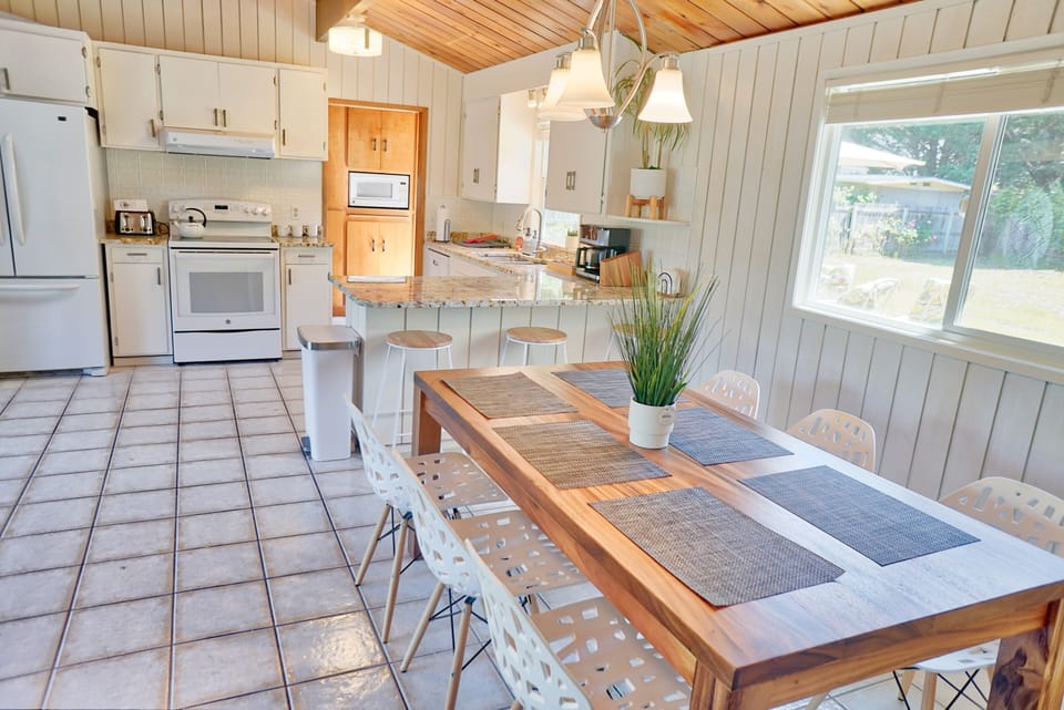 Well stocked kitchen and dining room.
