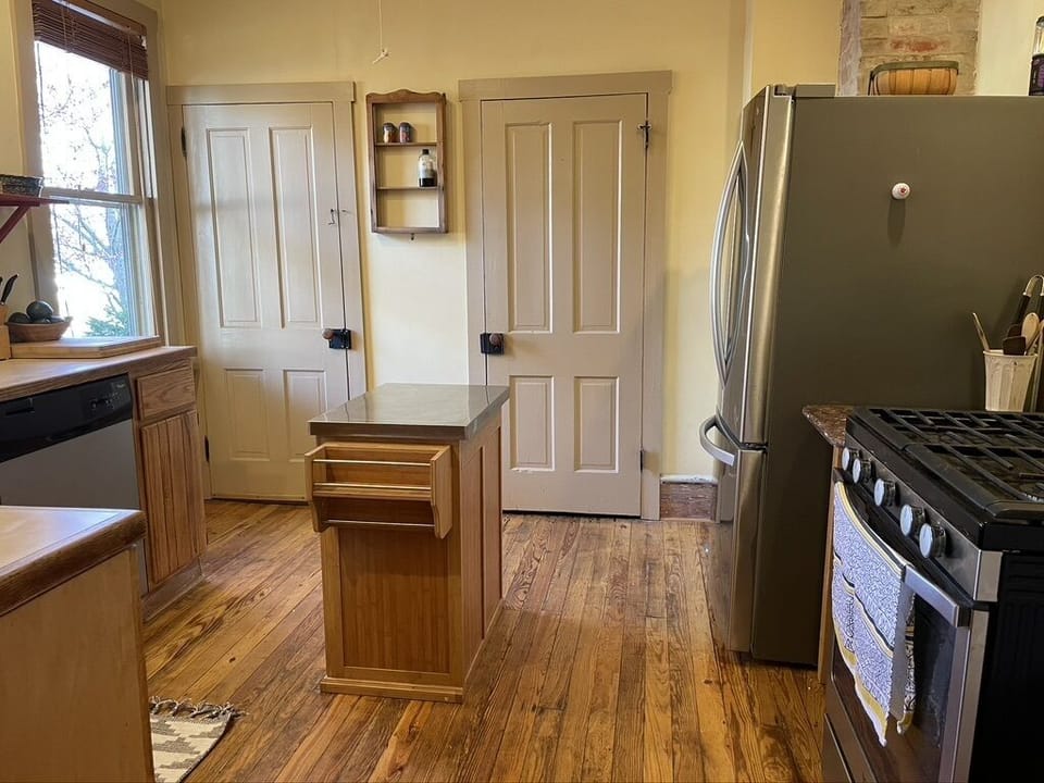 Righthand door to large pantry closet. 