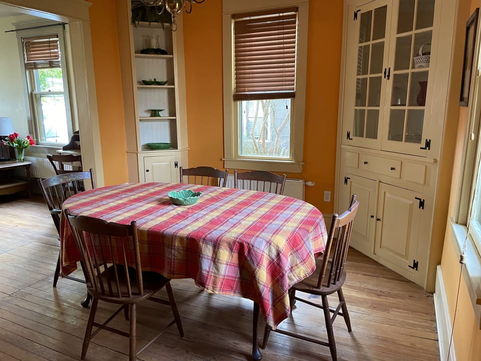 Plenty of dishes - enjoy this beautiful room... with view of garden & deck...