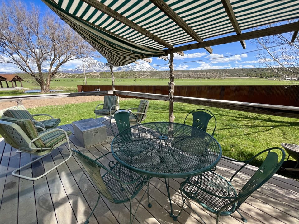 Expansive views of the mountains and gardens from the back patio. 