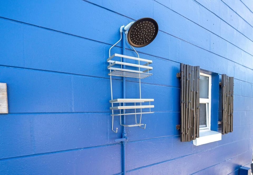 Outdoor shower by the pool - to rinse off sand.