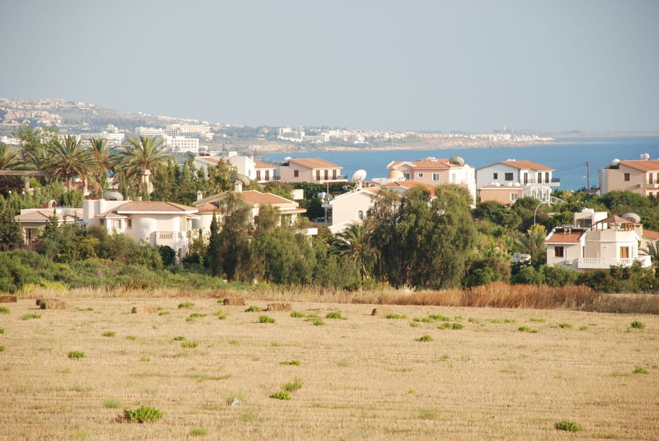 VIEW OVER FIELD TO CORAL BAY