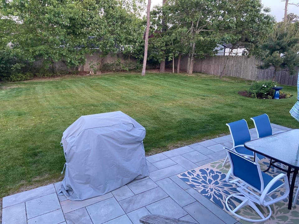 Plenty of space to play and relax outside. Additional chairs in the basement. 