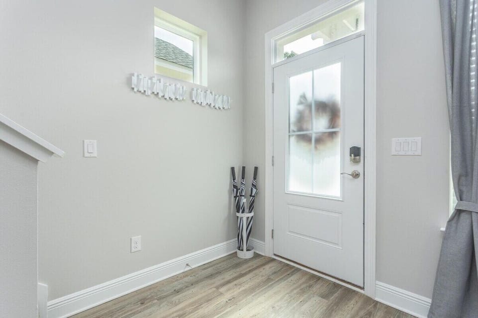 Cottage Entryway. Hang your coat or bags. We also provide umbrellas.  
