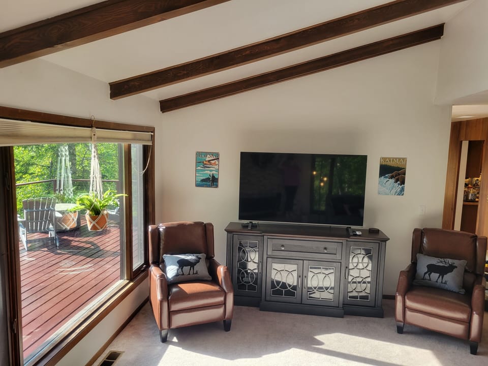 Living room has a Fire TV with DirecTV channels.