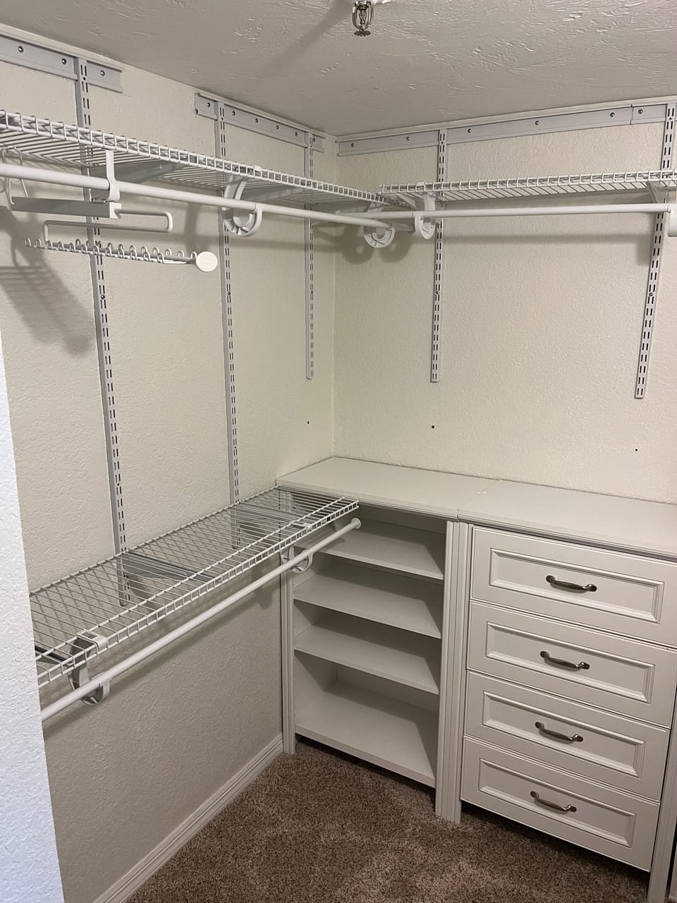 large master closet with plenty of storage space