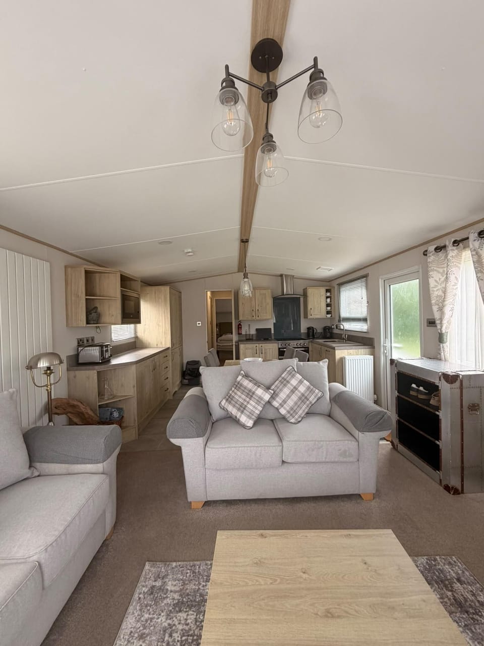Perfect for family or friends, our classic caravan's twin bedroom offers a cosy and practical space for everyone to rest.