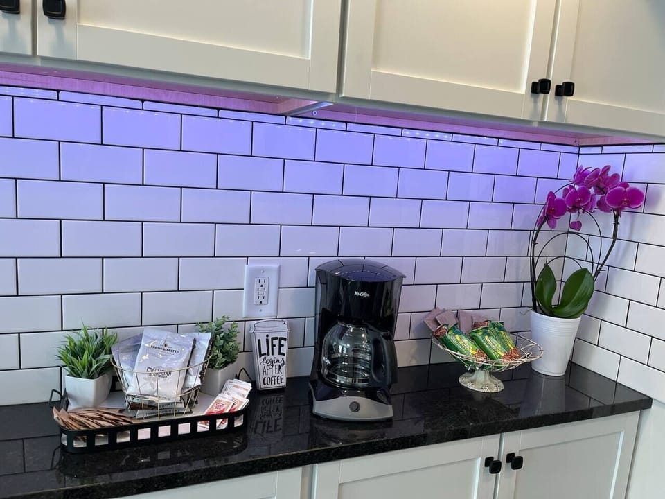 Grab a hot beverage and snack from the fully stocked coffee bar.