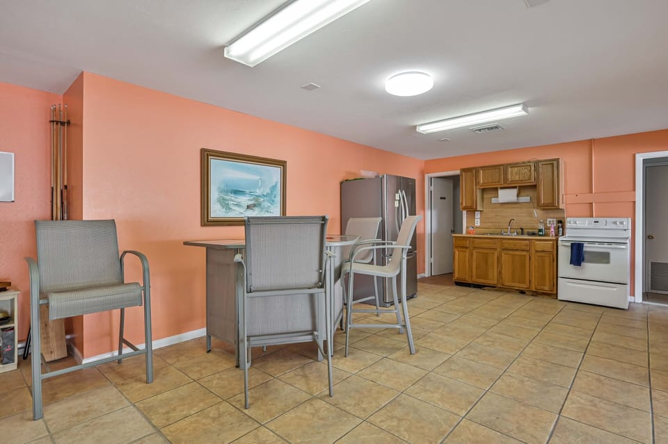 Usable outdoor kitchen to expand entertainment opportunities.
