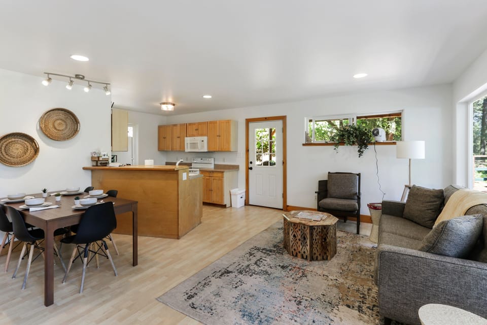 Open plan kitchen & dining.  Table extends to seat 10, + folding trays for 12.
