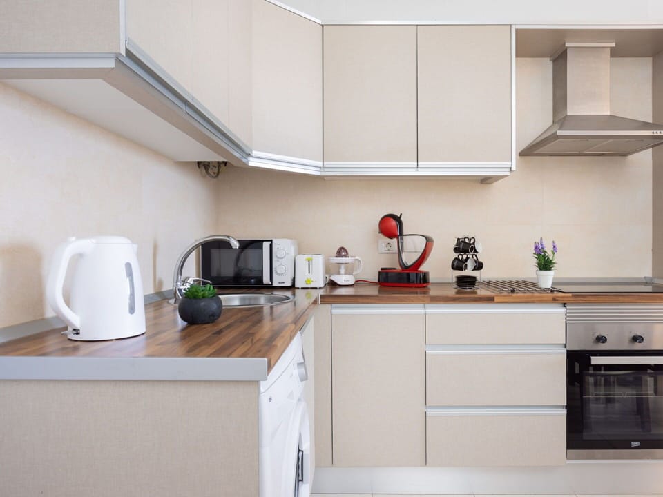 Cabinetry, Furniture, Countertop, Kitchen Appliance, Gas Stove, Kitchen Stove, Building, Kitchen, Cooktop, Kitchen Sink