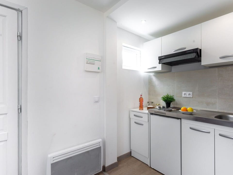 Building, Cabinetry, Kitchen Appliance, Interior Design, Floor, Home Appliance, Flooring, Door