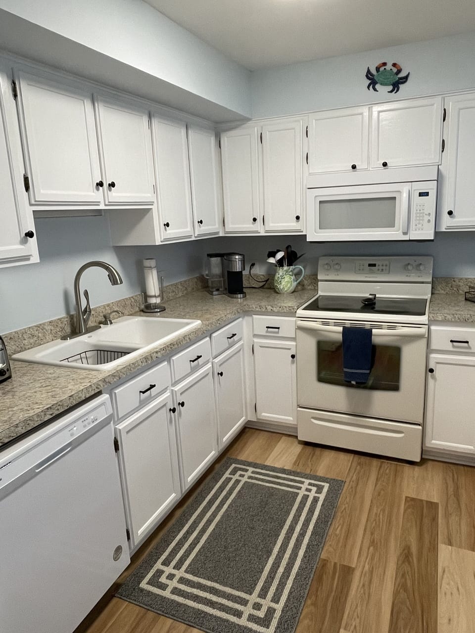 Stocked kitchen will full size fridge, microwave, dishwasher, Keurig, stove…