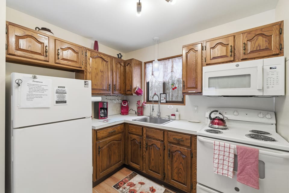 Kitchen with cooking ware. Coffee maker ( drip and Keurig)