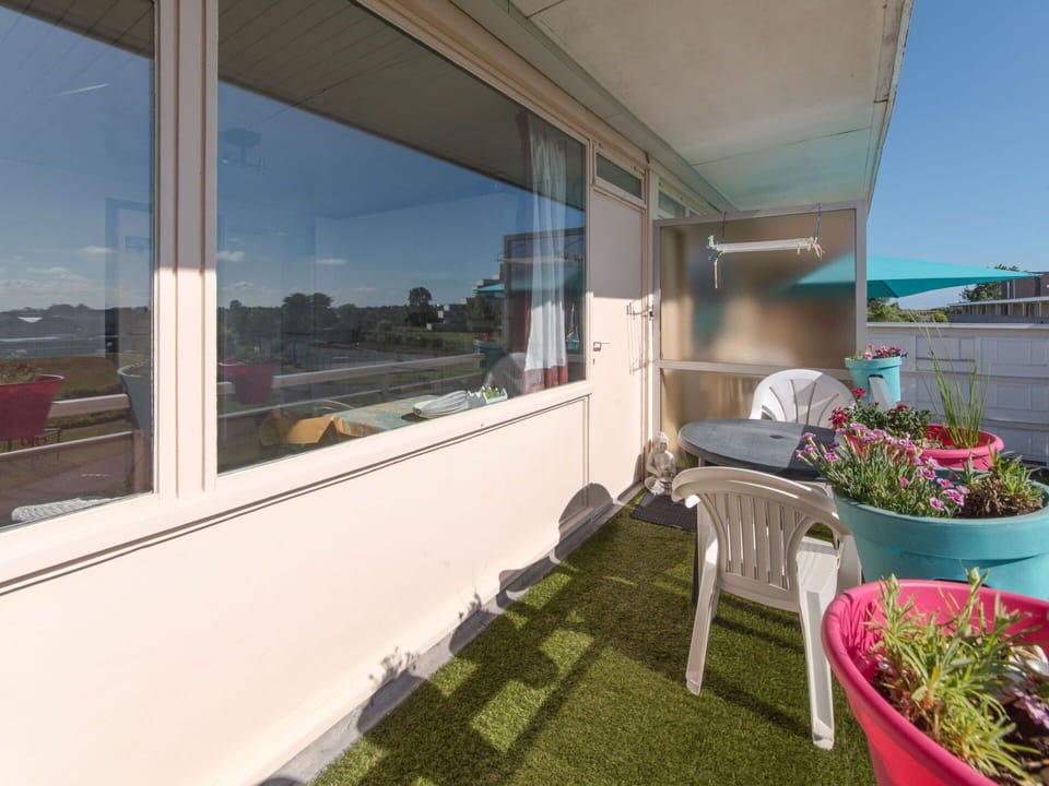 Building, Property, Plant, Sky, Flower, Shade, Interior Design, Window, Chair, Architecture