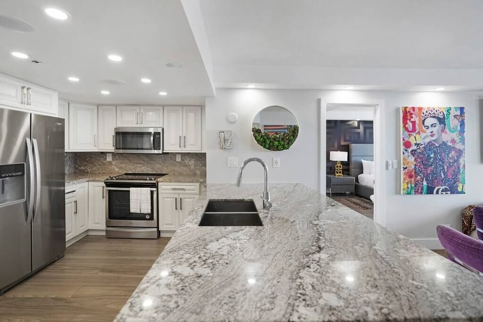 Fully equipped kitchen with separate laundry room off kitchen