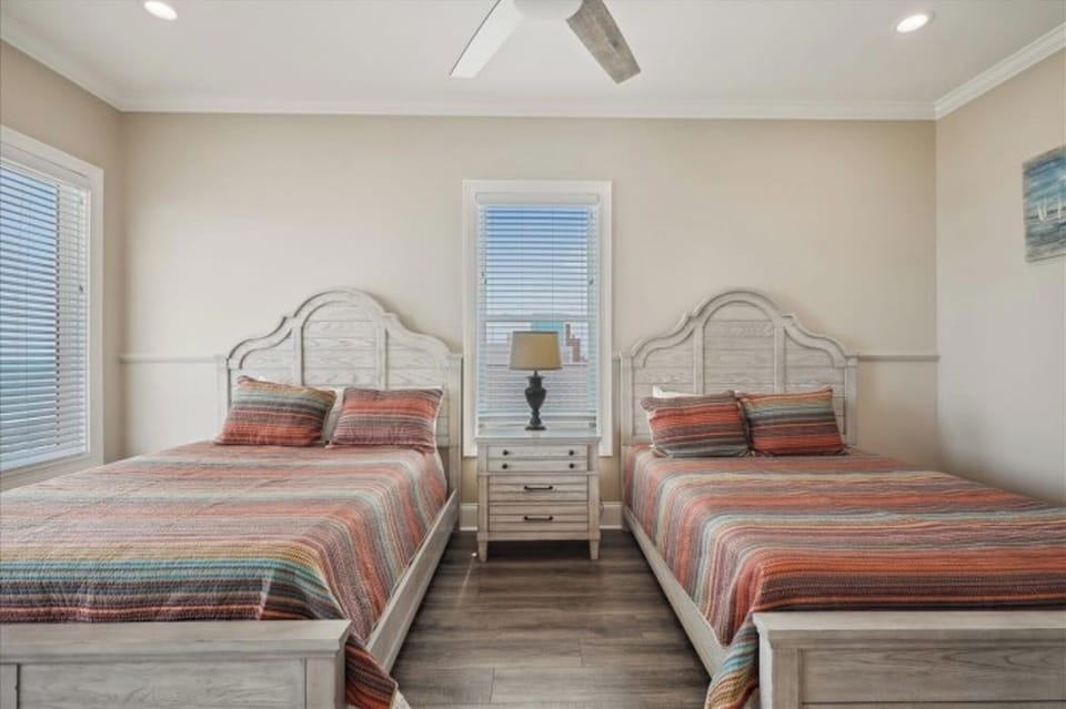 Relax after a day at the beach in your private room watching your favorite show.