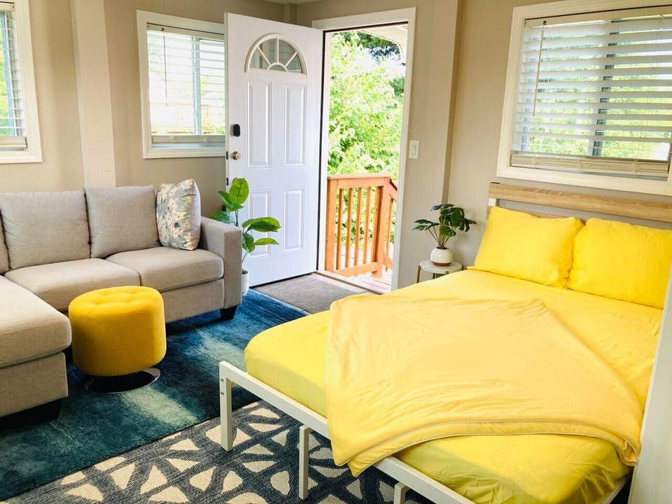 Sofa with Full-size bed and 55” 4K TV