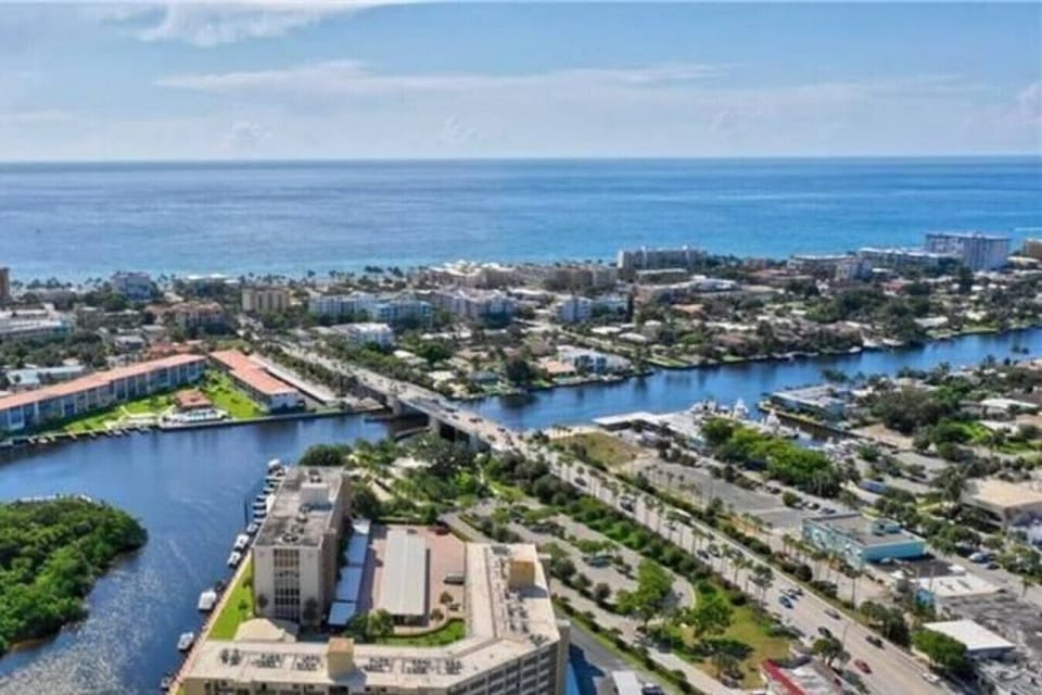 Sky view of the surrounding area in Deerfield Beach, shopping, restaurants, and the street leading to the beach from the property.