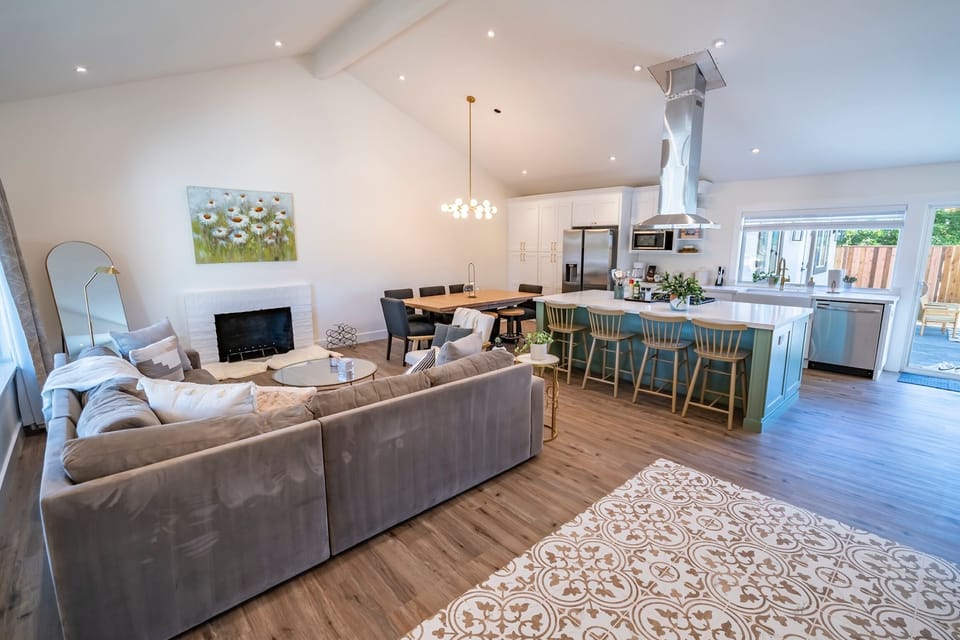 Entrance view of living room, dining room, and kitchen