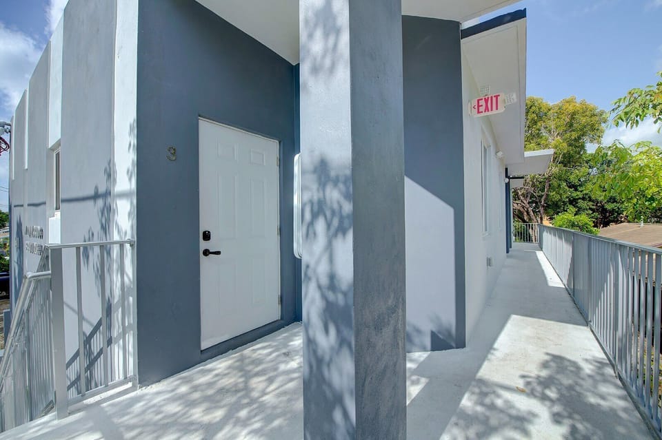 As you go up stairs to 2nd floor of the building, you'll find Apartment 3 door. 