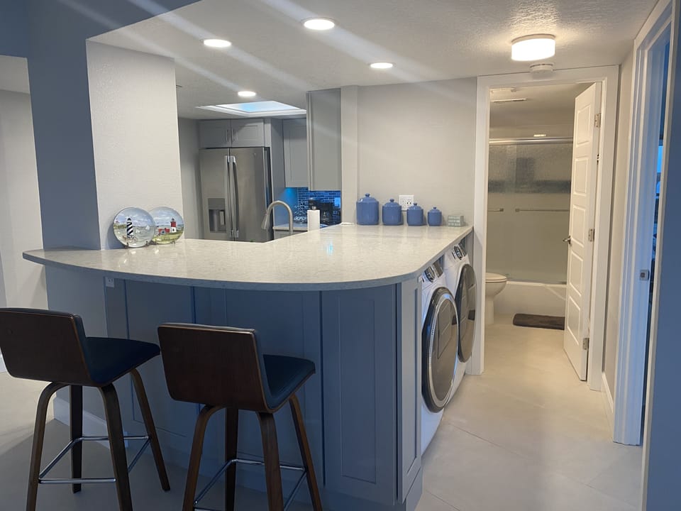 You will enjoy the open kitchen complete with seating and ocean views!  