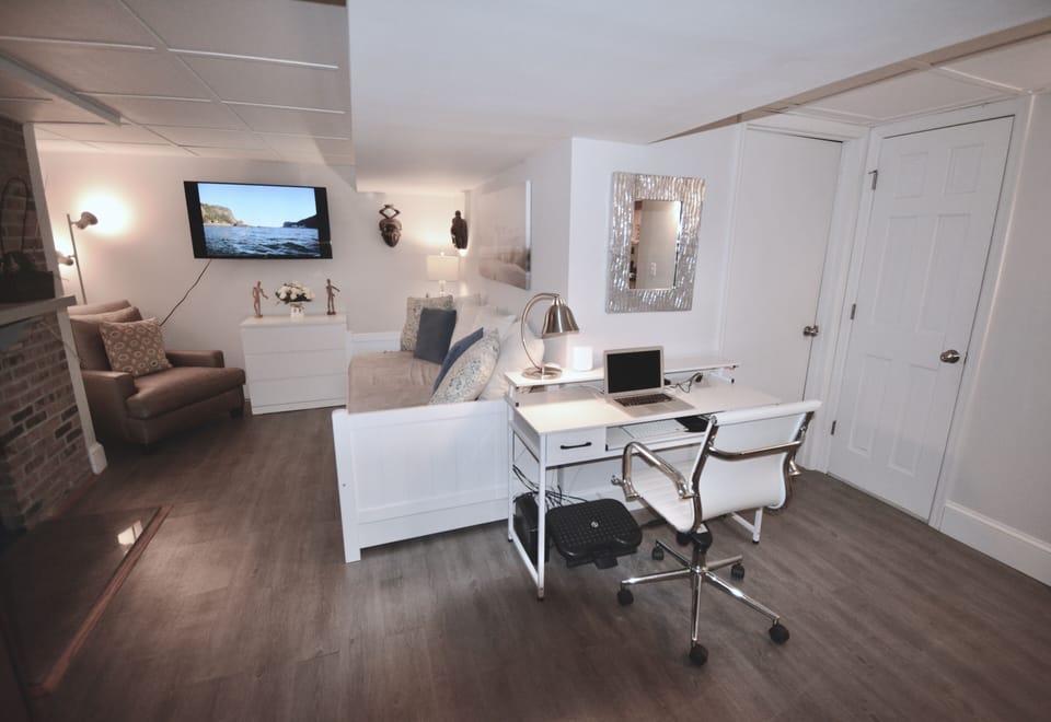 Lower level with office desk off bedroom 4.