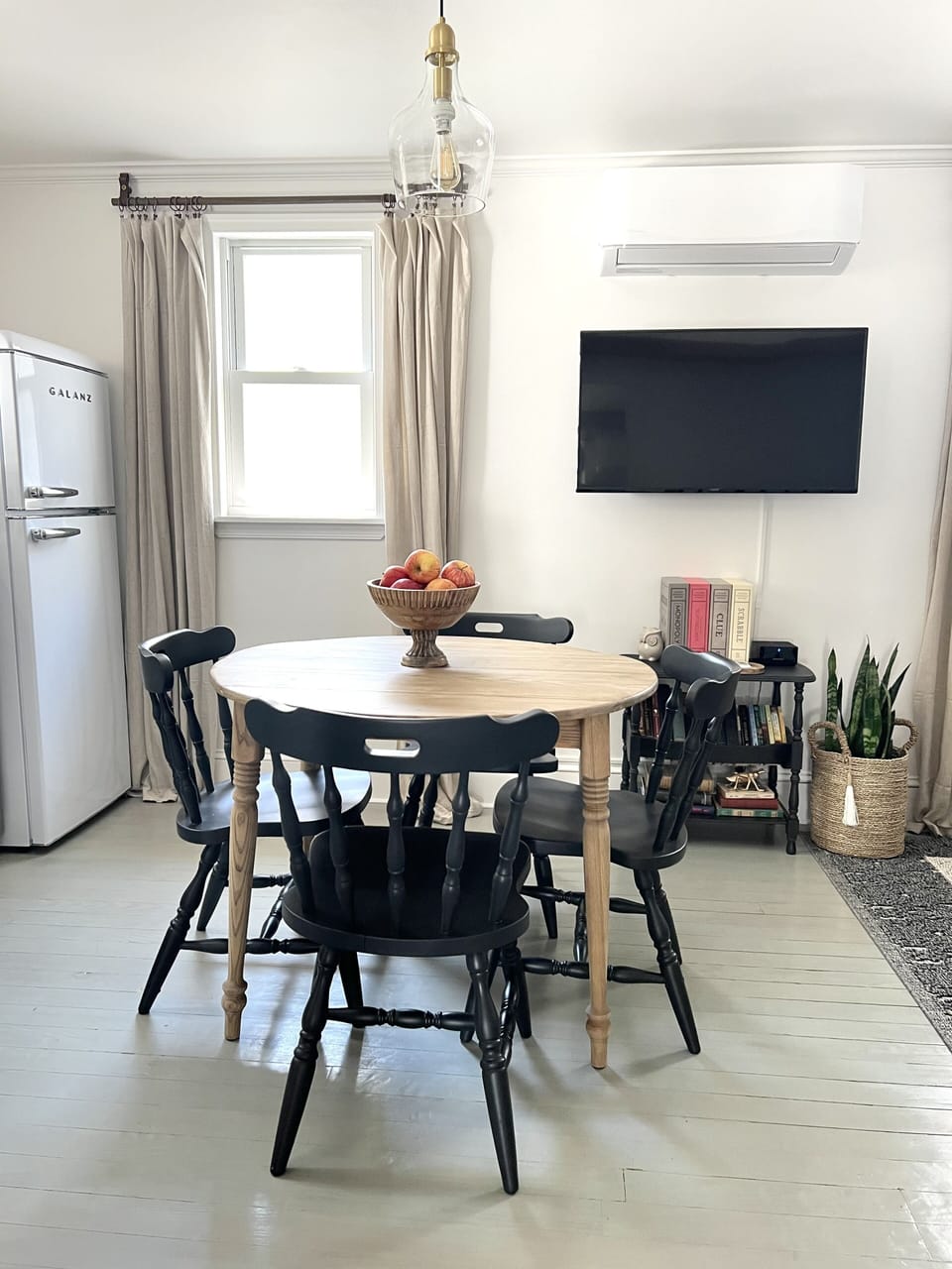 Windows provide natural light for comfortable dining.
