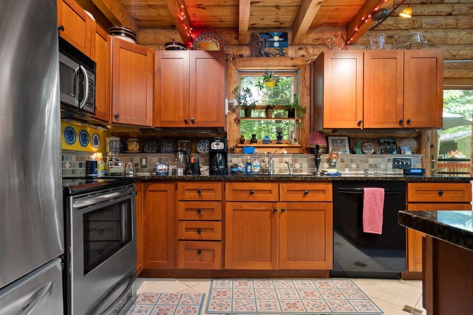 Prep your favorite dishes in the fully equipped kitchen w/ ample counter space & storage.