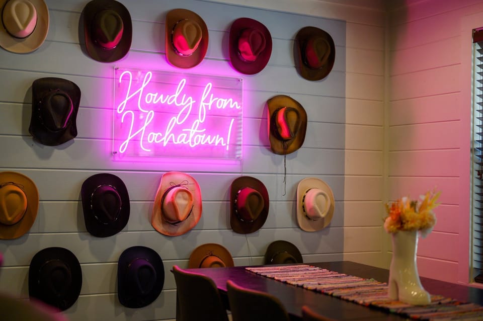 The hat wall up close – a playful, stylish feature that brings the cowboy spirit to your stay with every glance!