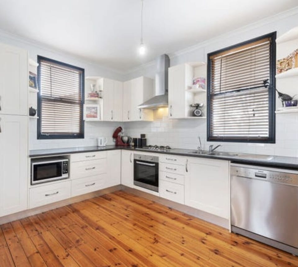 kitchen with dishwasher  oven, microwave 