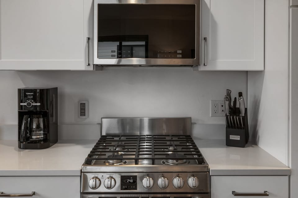 Full kitchen and drip coffee machine.