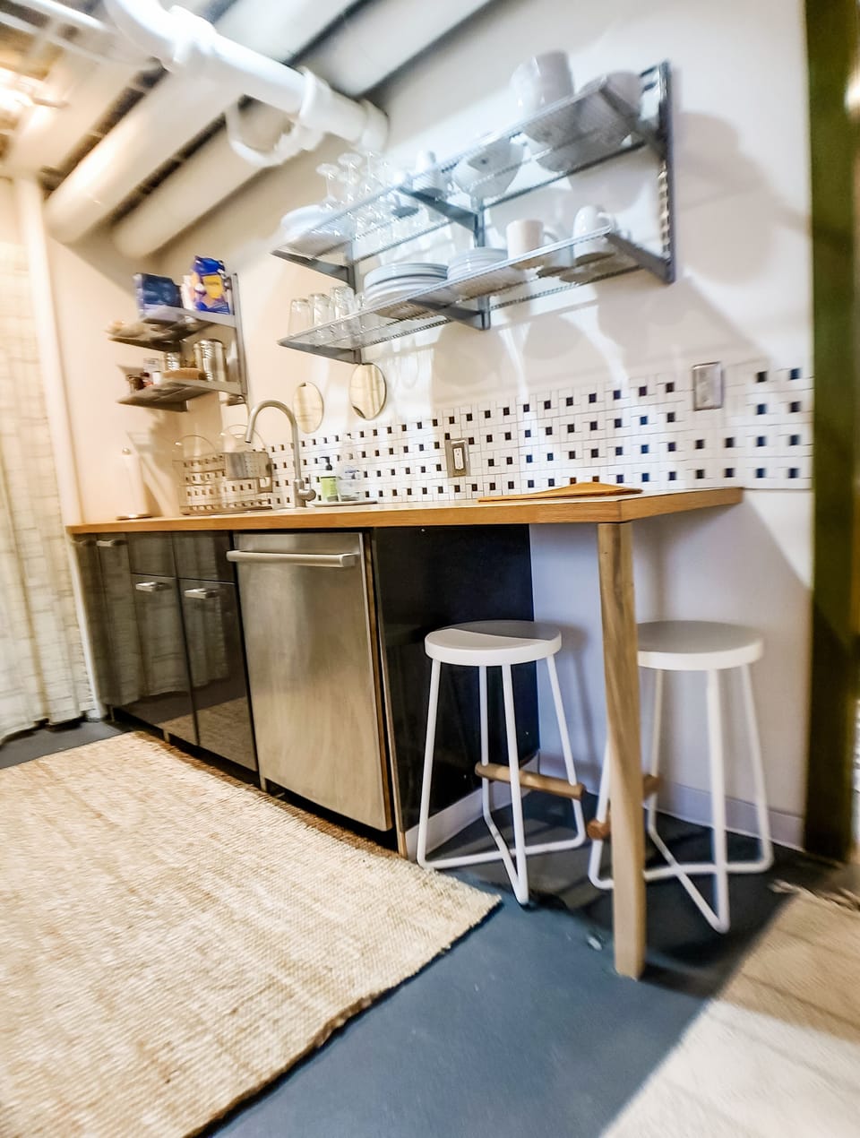 Seating area in kitchen. Dining and cooking ware provided. Dishwasher available.