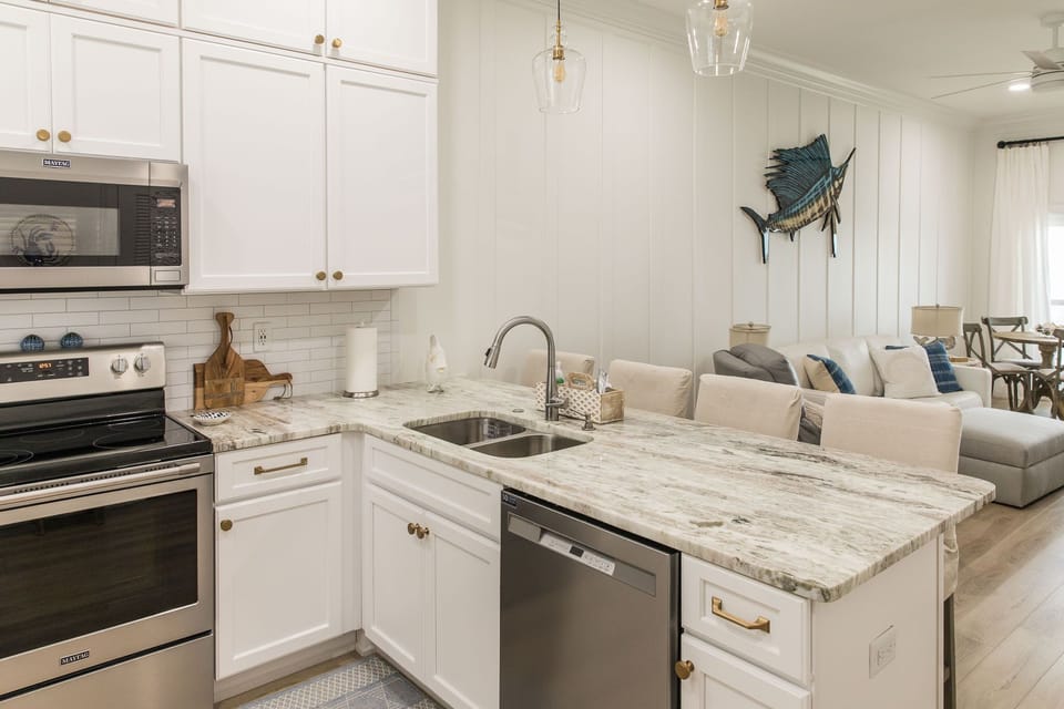 Beautiful quartzite countertops, USB outlet, & comfy bar seating for 4! 

