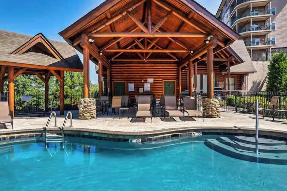 Cooling off in style from our resort's outdoor pool in the Smoky Mountains! ️