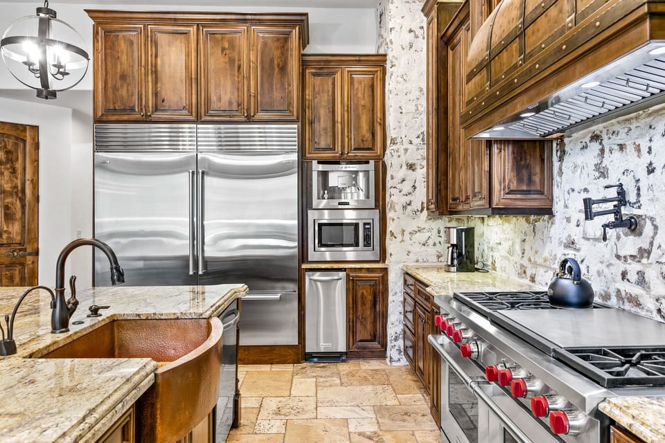 Gourmet Chef's Kitchen featuring built in espresso machine ready for your morning cup!