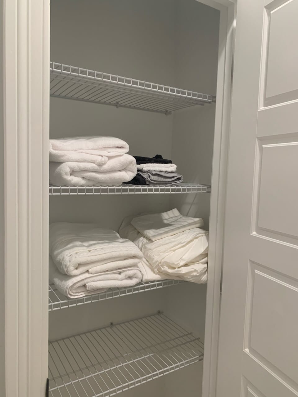 Fully stocked laundry closet in each bathroom with thick luxury linens